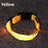 LED reflective dog collar glowing green on a night walk