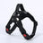 Breathable adjustable dog harness with reflective lead in Black, in use with a pet