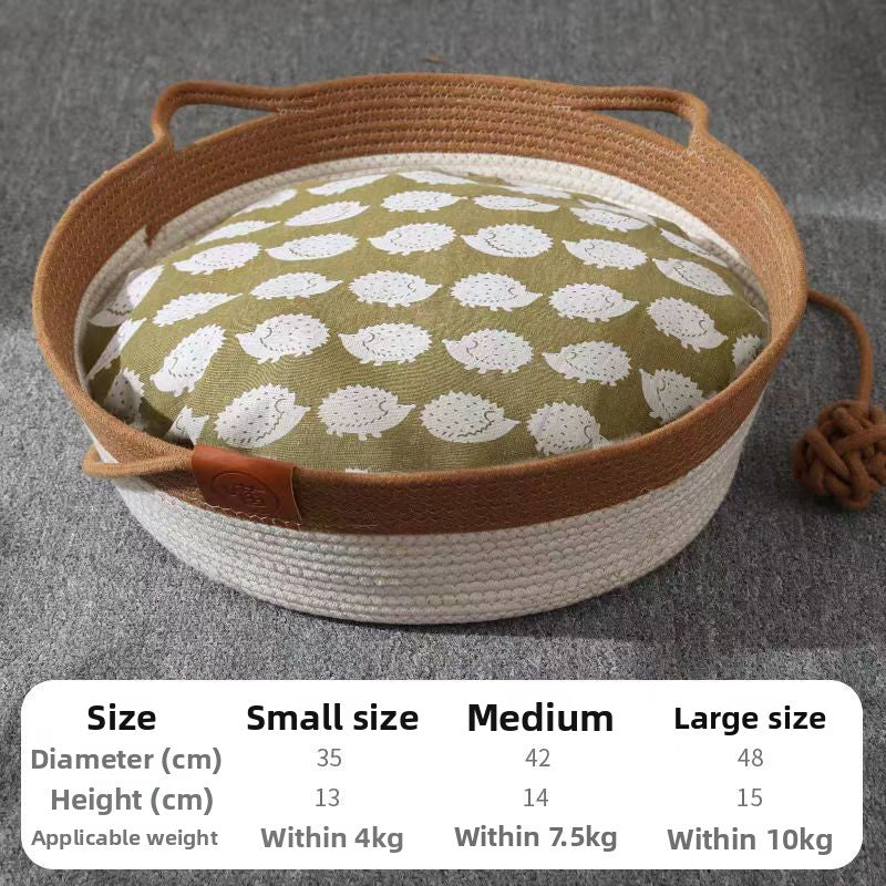 Cat sleeping in a green woven rattan bed with fish pattern pad