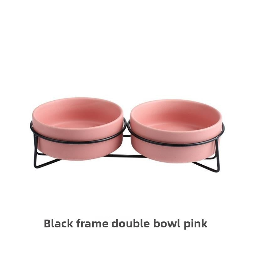 Raised glazed ceramic pet bowl on a stand in pastel yellow, view 19