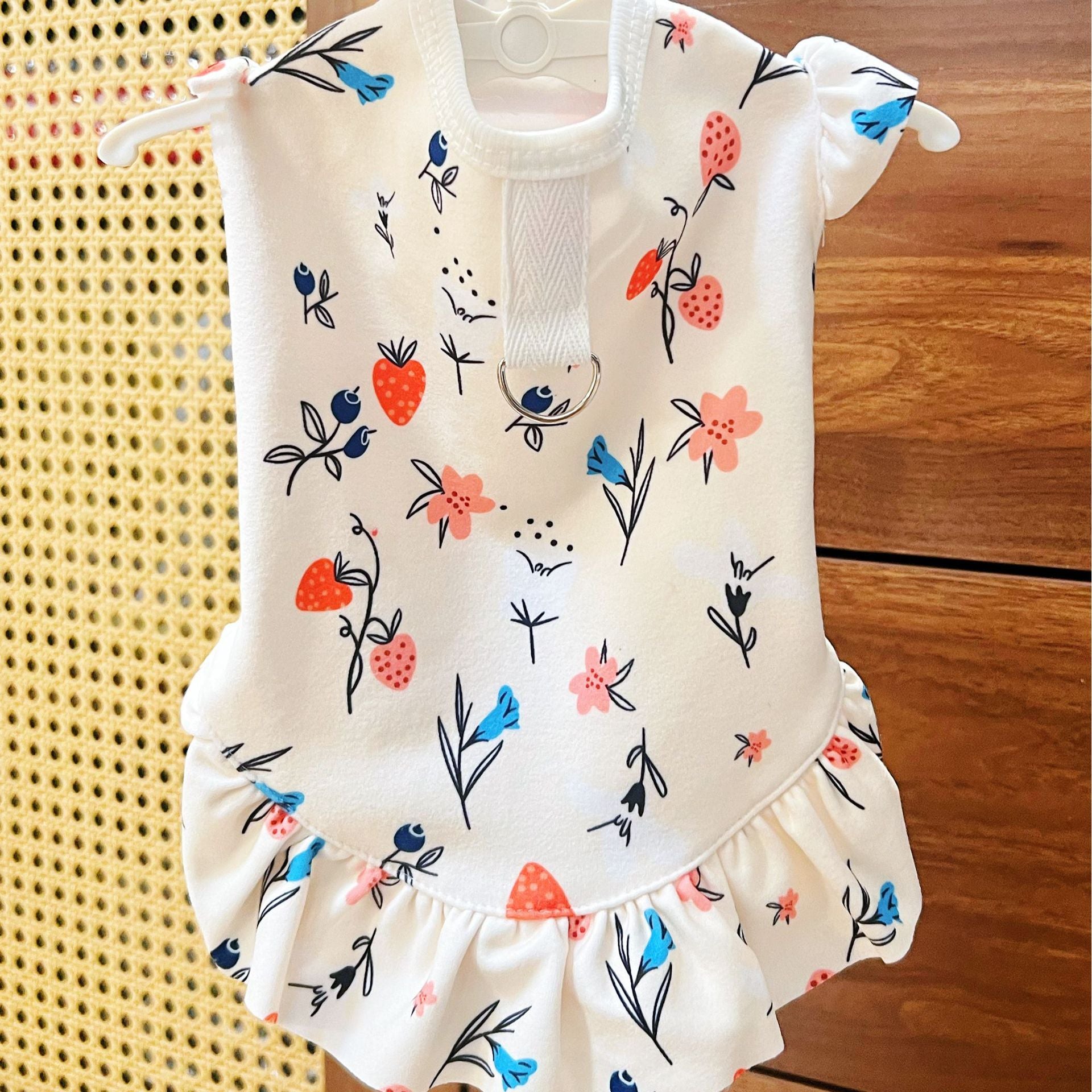 Soft polyester dog vest for autumn and winter in Strawberry, in a home setting