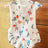 Soft polyester dog vest for autumn and winter in Strawberry, in a home setting