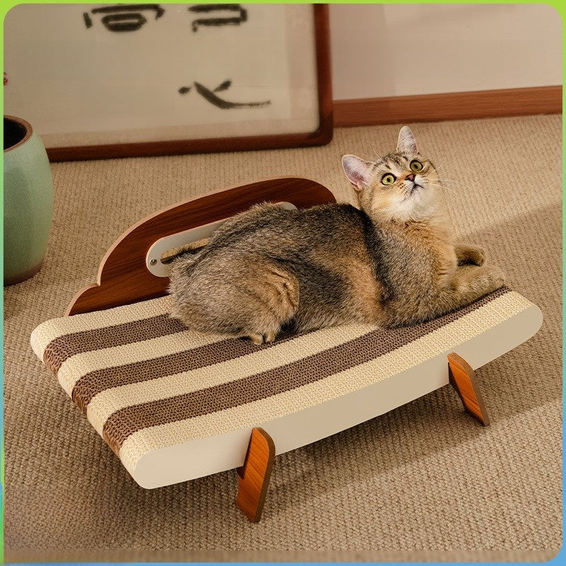 Corrugated cardboard cat scratcher lounge chair with a cat resting on it - photo 1