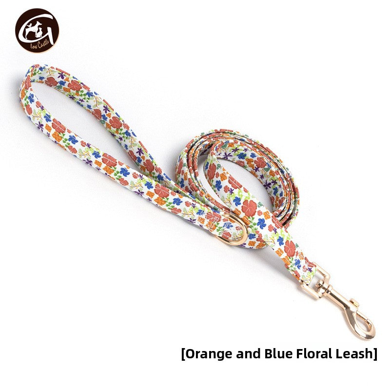 Floral fabric dog collar with gold buckle in Pink Floral Bow, in a home setting