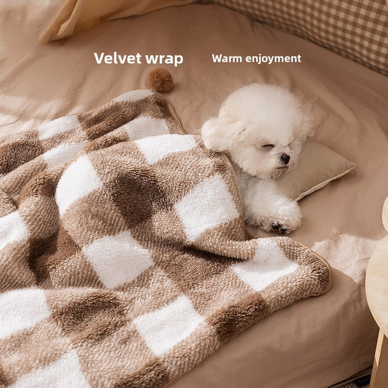 Double-sided flannel pet blanket in brown with pom-pom trim