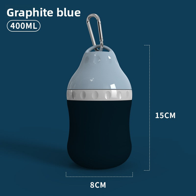 Portable silicone pet water bottle with built-in bowl, in a home setting