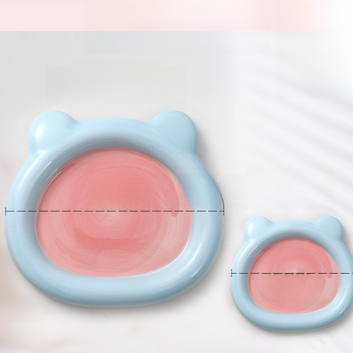 Glazed ceramic pet food plate with bear design in blue and pink, view 7