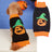 Orange pumpkin print knitted jumper on a small dog