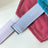 Checked cotton pet cape collar for dogs and cats in Blue, in a home setting