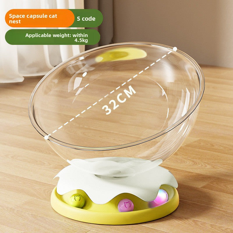 Clear capsule cat bed in transparent plastic with cream base, view 8