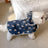 Hooded waterproof dog rain poncho with bear print in Cream White Bear, side view