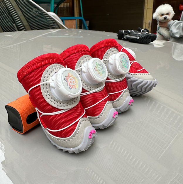 Plush lined winter dog shoes with rubber sole, in use with a pet