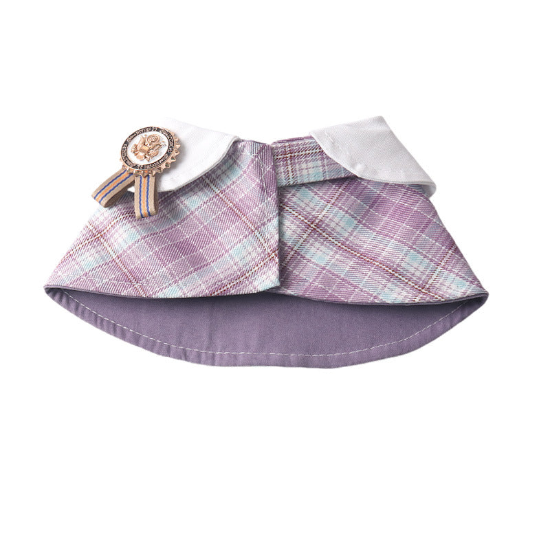 Checked cotton pet cape collar for dogs and cats, in use with a pet