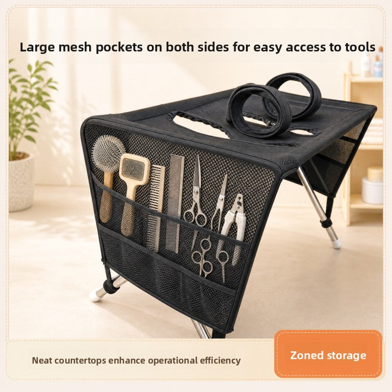 Folded pet bathing table in khaki and black for compact storage