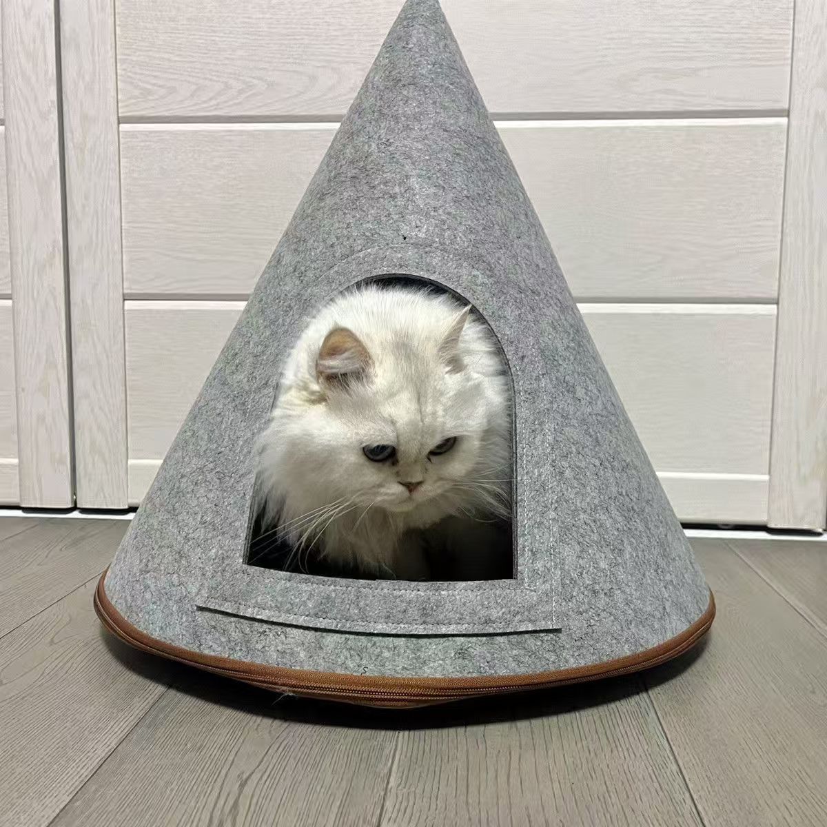 Christmas tree knitted cat nest with soft cushion inside, detail and texture view