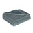 Dog lying on a beige flannel and fleece waterproof throw