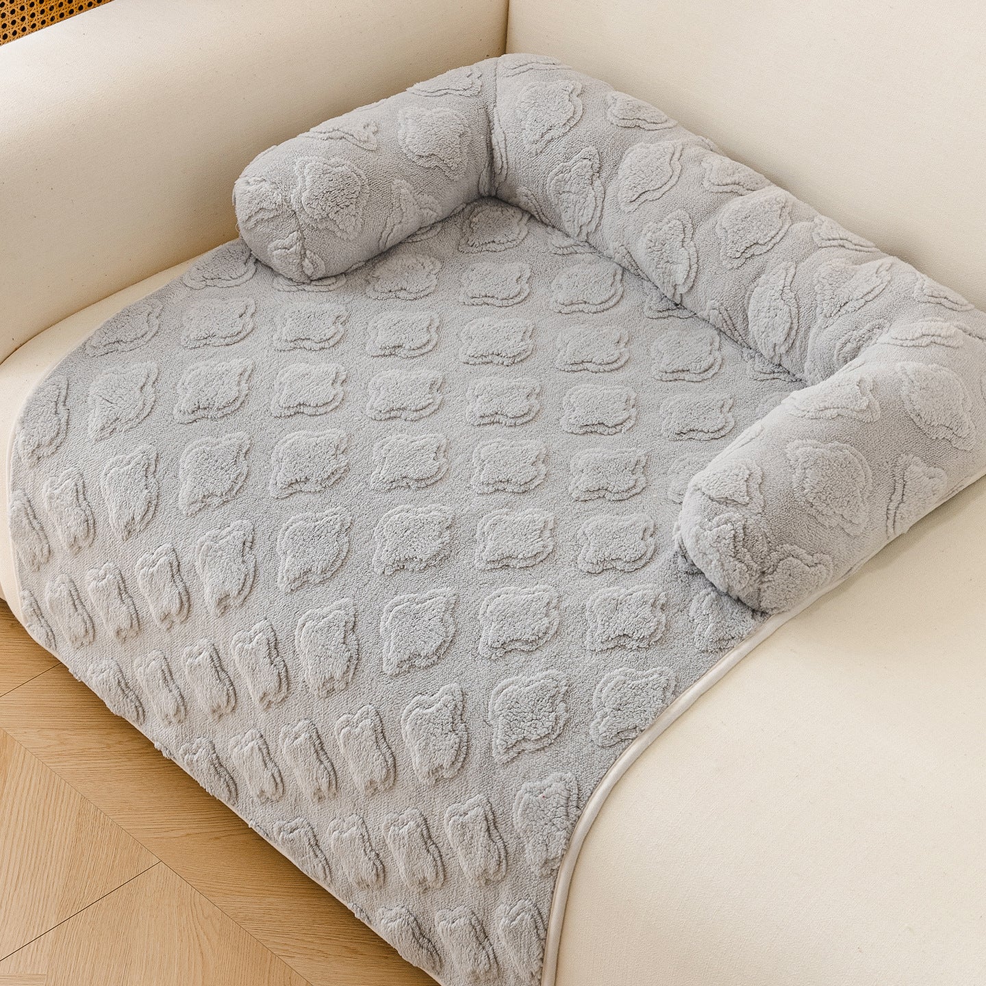 Cat resting on a coffee coloured soft pet mat with non-slip base