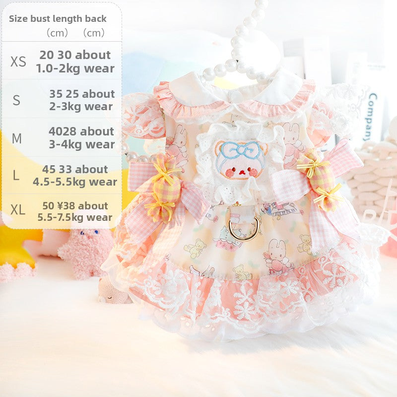 Small dog wearing a pink cotton princess dress