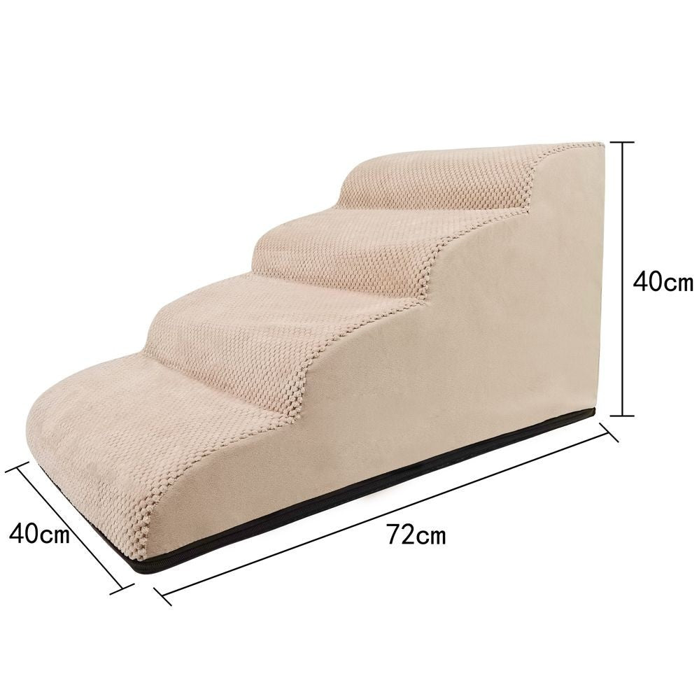 Beige two-step dog steps placed beside a sofa