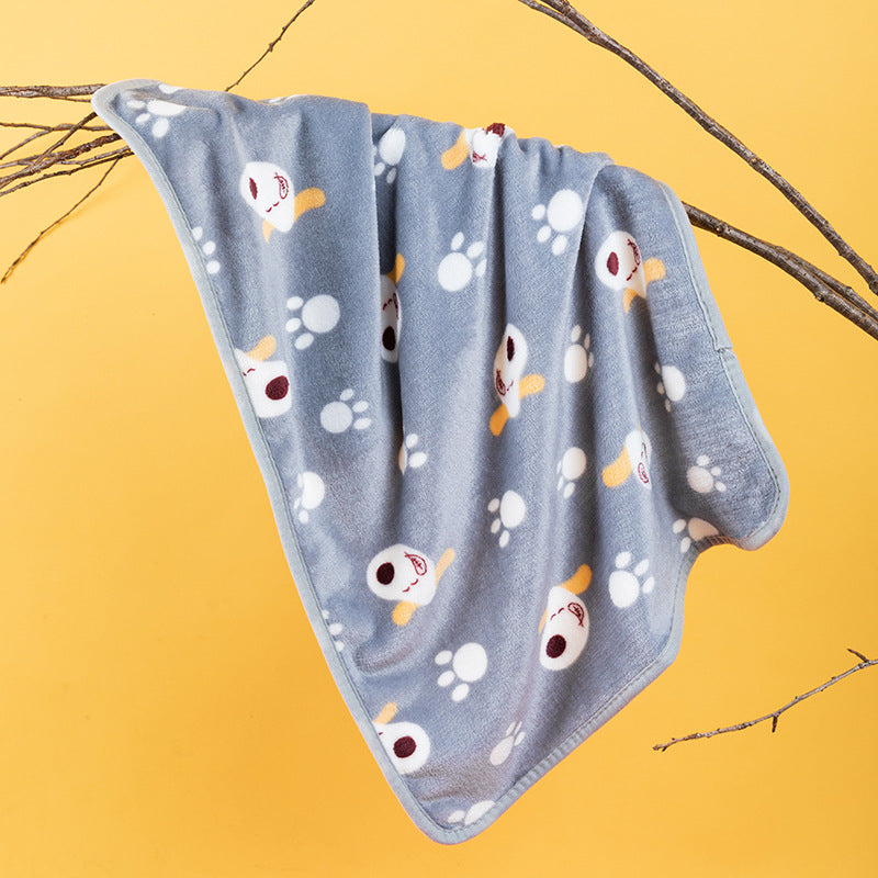 Soft flannel pet blanket with navy paw print
