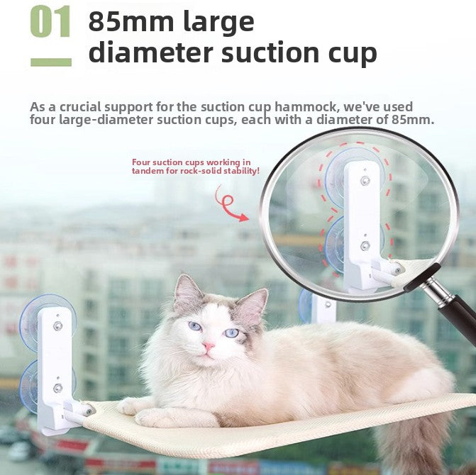Hanging window cat bed attached with suction cups