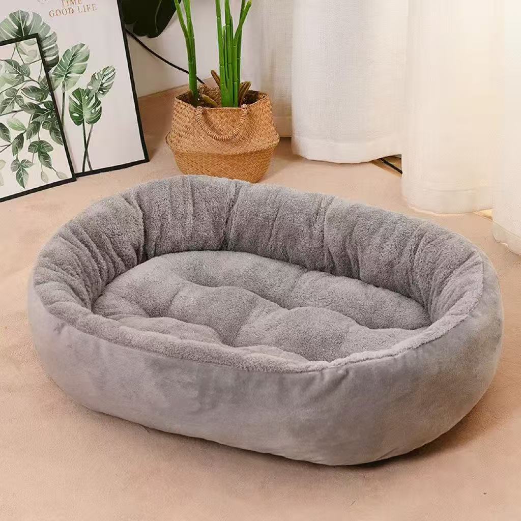 Oval wool blend pet nest bed in grey with cushion
