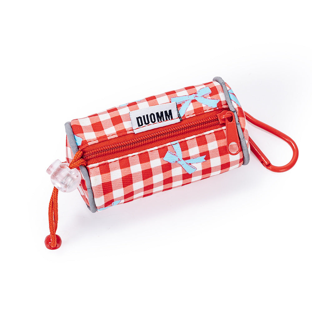 Plaid dog harness and lead with bow, available from Pet Royale UK