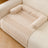 Light grey machine washable pet mat on a sofa
