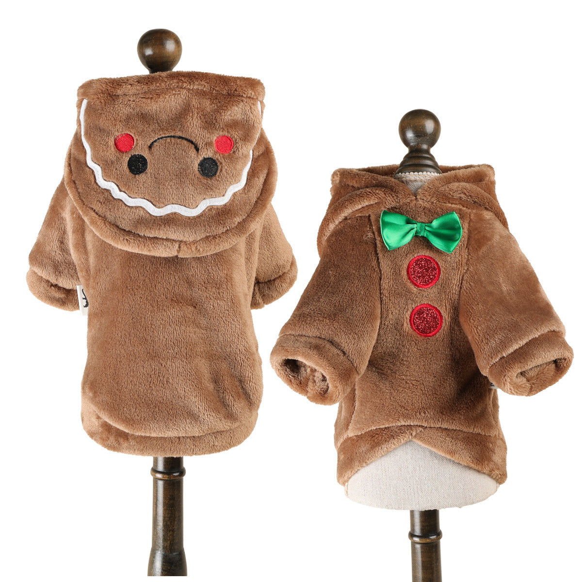 Small dog dressed in a plush gingerbread man costume