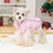 Christmas padded dog vest with reflective trim in Pink, in a home setting