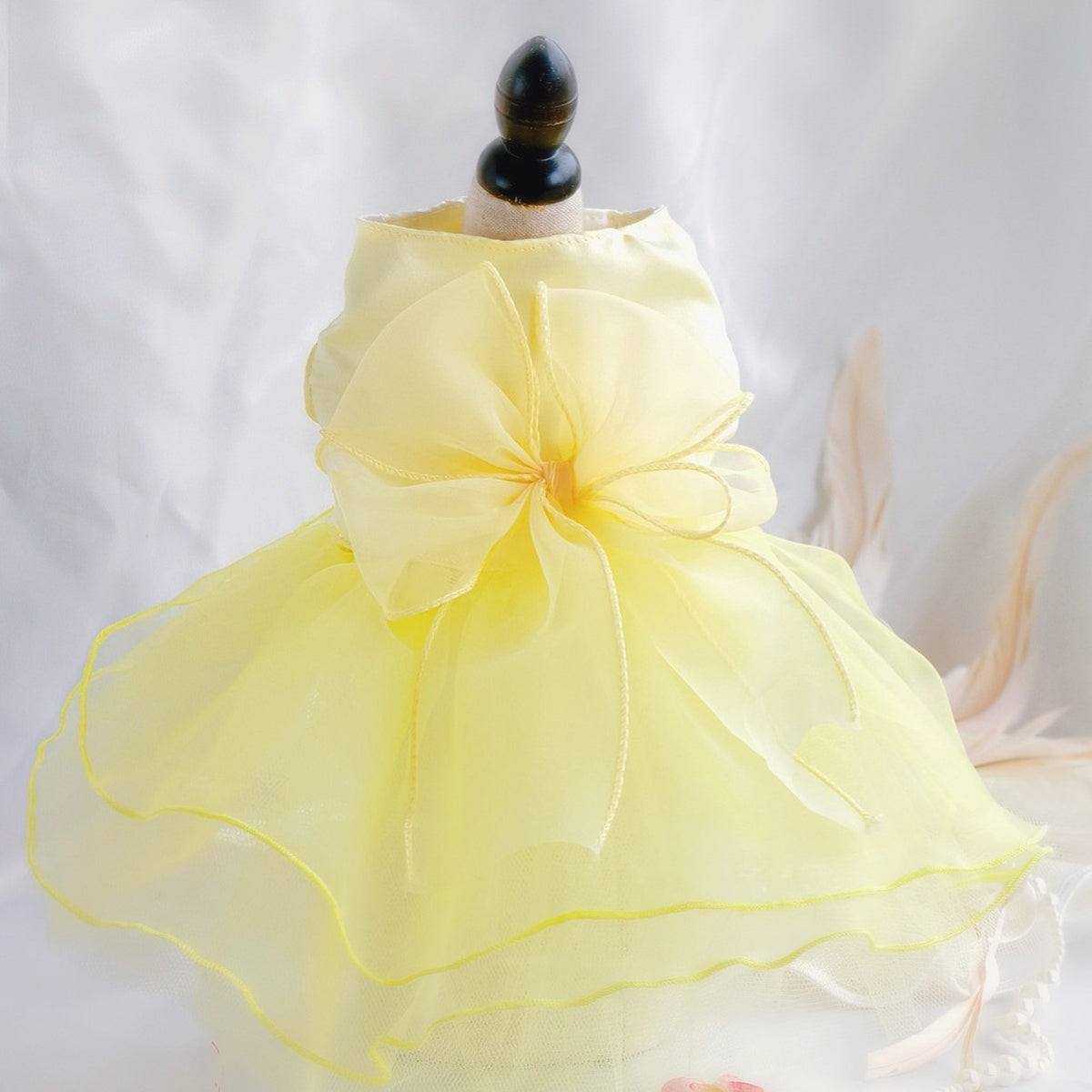 Small dog in a pink layered tutu princess dress