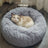 Round plush donut cat bed with raised rim, view 6