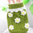 High collar knitted pet vest with floral embroidery, in a home setting