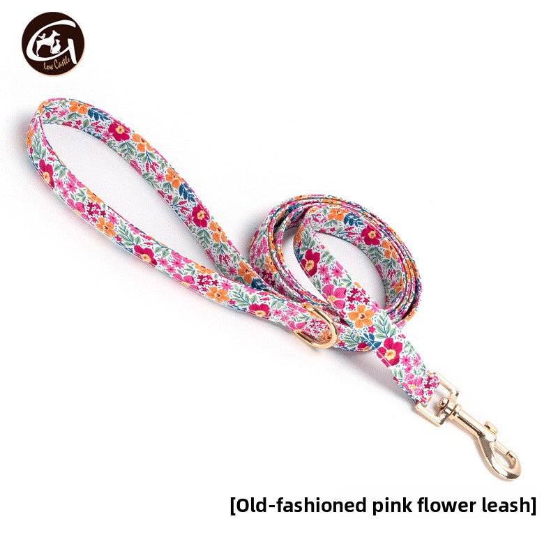 Floral fabric dog collar with gold buckle in Purple Floral Bow, showing size and shape
