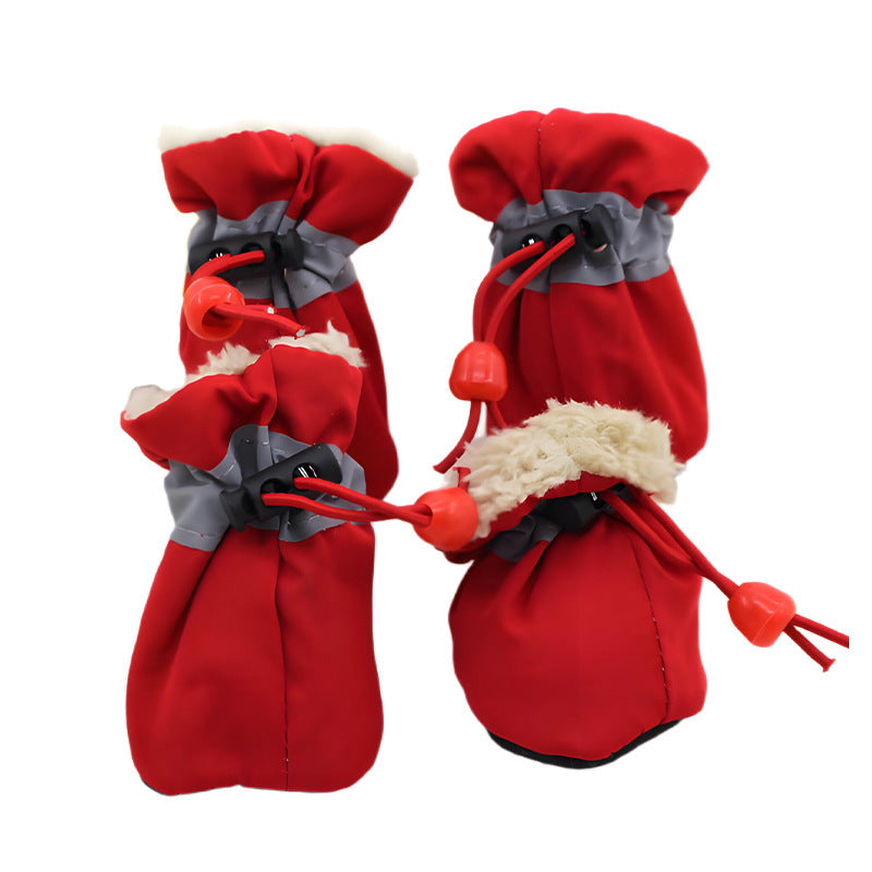 Anti-slip waterproof dog shoes with reflective strips in Pink, in use with a pet