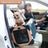 Foldable car pet crate for dogs and cats, shown in 3 colours and styles