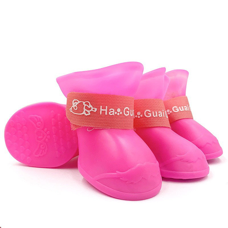 Waterproof silicone dog rain boots with non-slip soles in Purple, side view