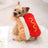 Small dog dressed in a priest Halloween costume