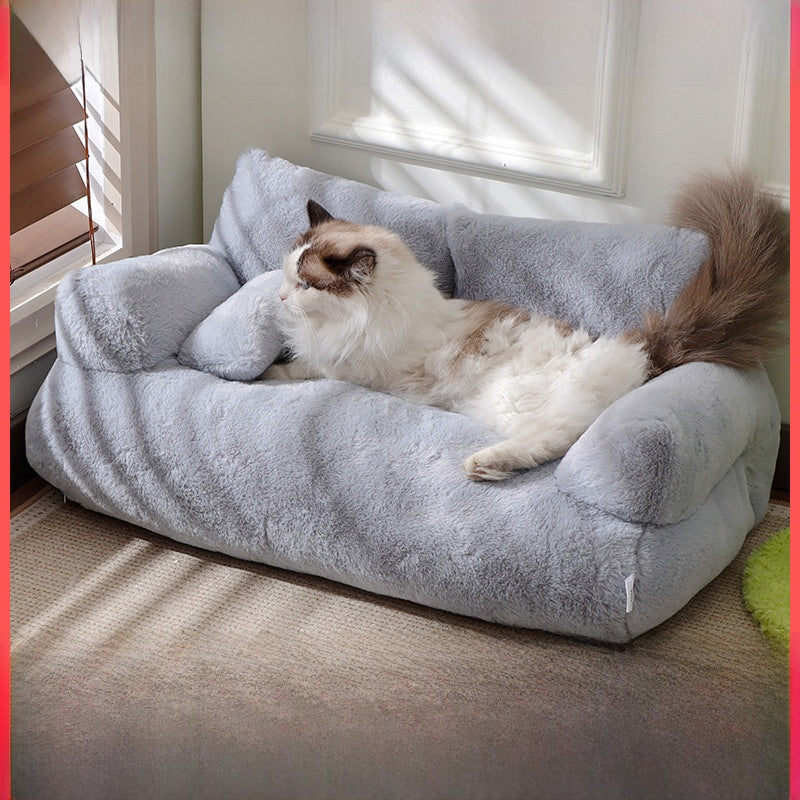 Cat resting on a sakura pink washable sofa bed