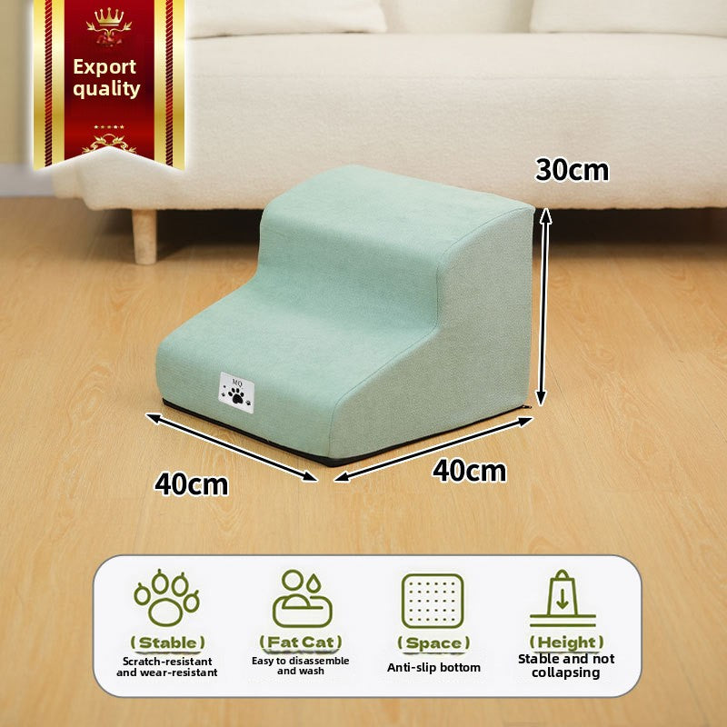 Small dog using non-slip foam steps to reach a sofa