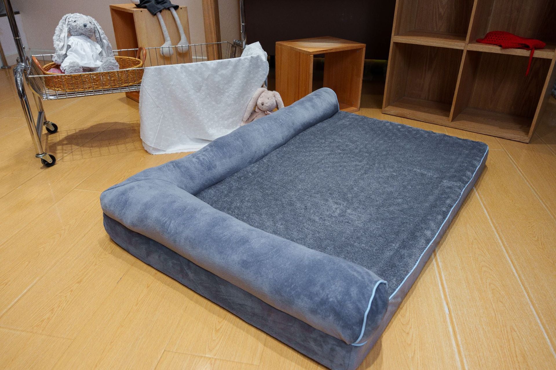 Blue plush cat bed in medium size with soft cover