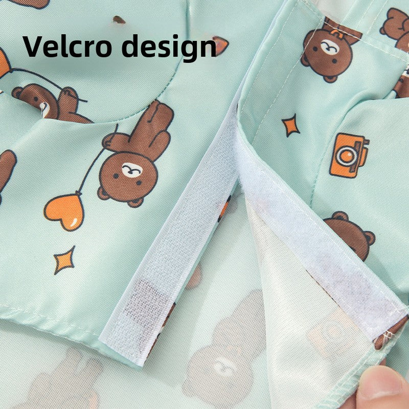 Waterproof dog raincoat with cartoon print in Flower, side view