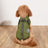 Warm padded cotton dog coat with reflective straps in Pink, in use with a pet