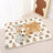 Thick padded pet mat cushion with print, shown in 12 colours and styles