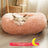 Round plush donut cat bed with raised rim, view 36