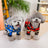 Reflective camo four leg dog coats in red and blue