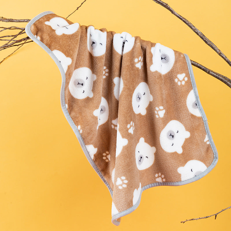 Cat curled up on a planet cat print pet blanket