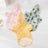 Waterproof dog raincoat with cartoon print in Travel Bear, in a home setting