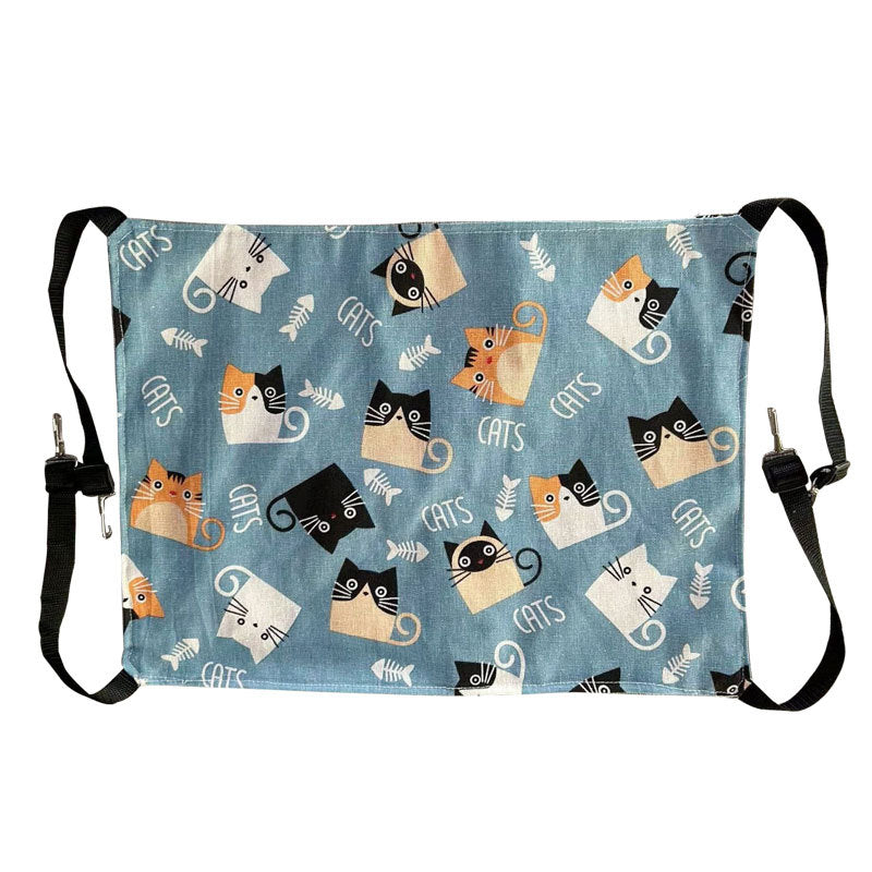 Blue cat print hanging hammock hooked inside a crate