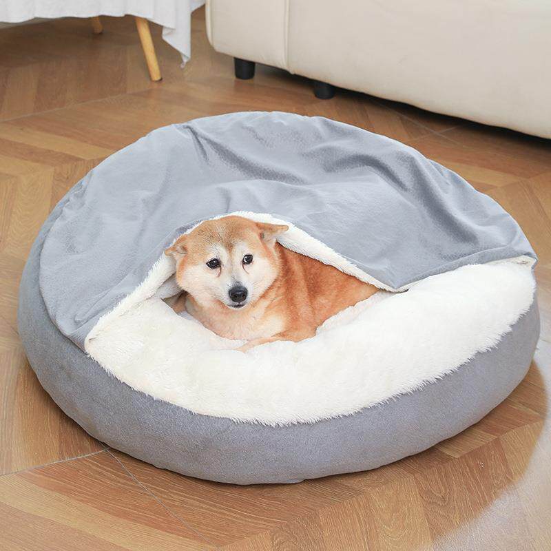 Shell shaped plush pet bed with attached blanket, shown in 2 colours and styles